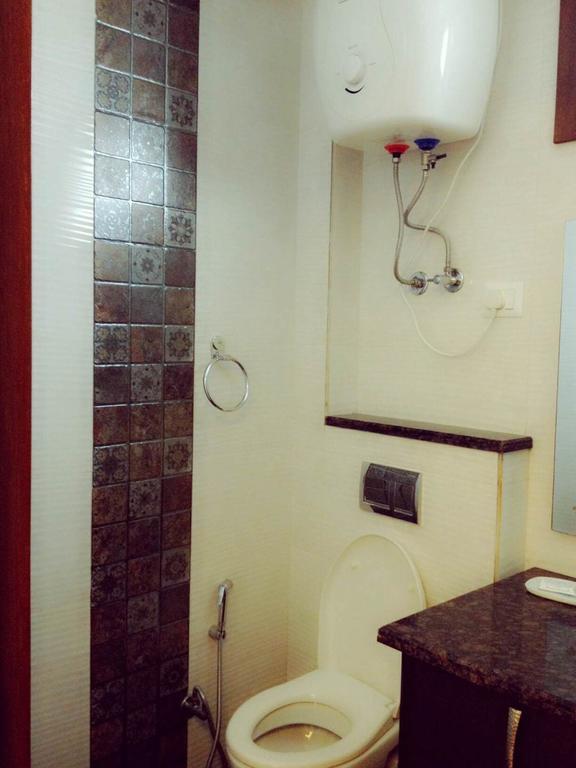 Woodpecker Service Apartments - Green Park Нью-Делі Номер фото
